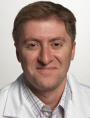 Dr. Adam E. Vella