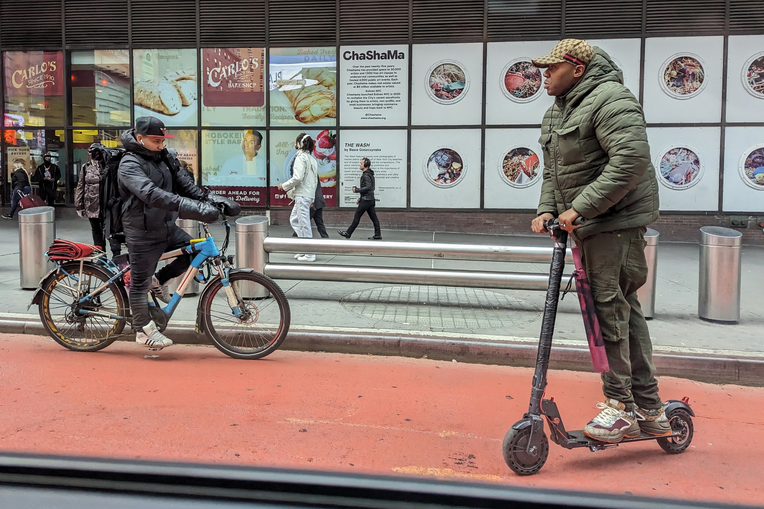 ebike and scotter driving down Manhattan street